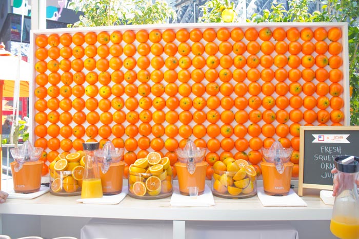 Orange Wall added texture and served as the backdrop to the bar where staff poured complimentary cups of freshly squeezed orange juice.