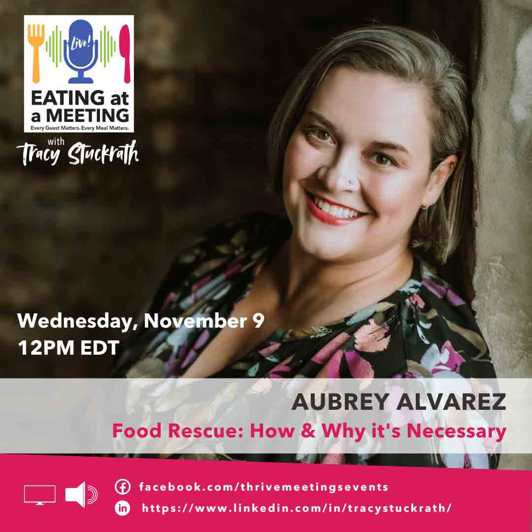 Smiling Woman in a black shirt with a floral print leaning her back on a cement wall. The photo is promoting her appearance on the Eating at a Meeting LIVE podcast with Tracy Stuckrath Wednesday, November 9 at 12PM EDT. Aubrey Alvarez, "Food Rescue: How & Why it's Necessary"