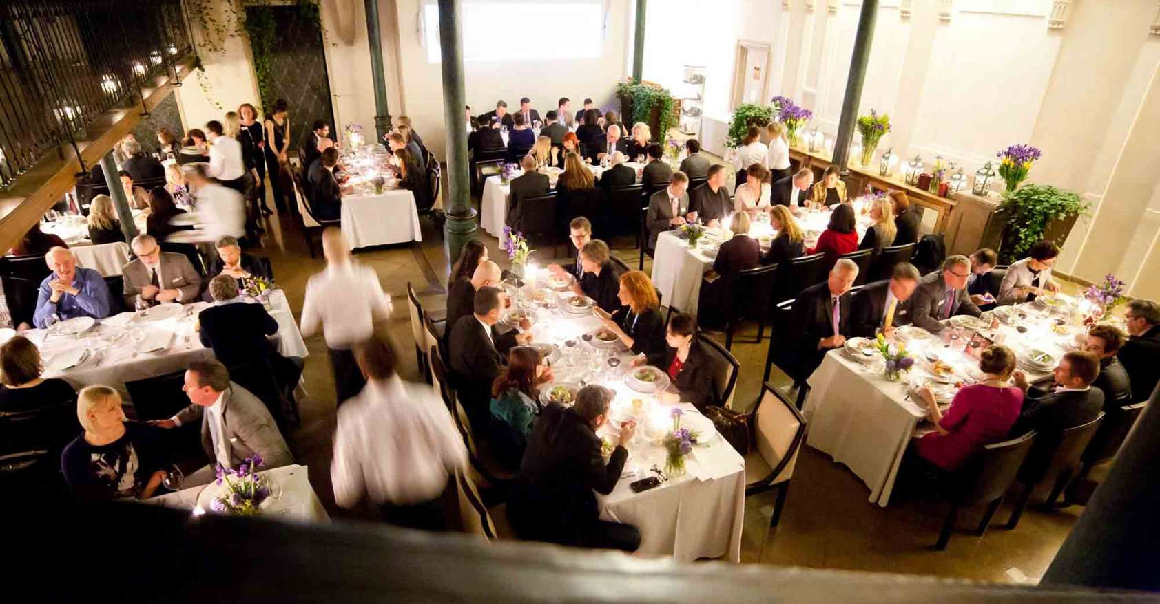 Business people eating dinner at private event special diets