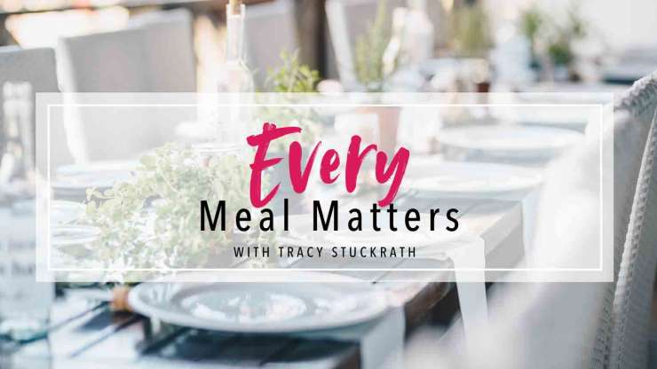 Every Meal Matters text on top of a picture of a long wooden table with white plates and chairs