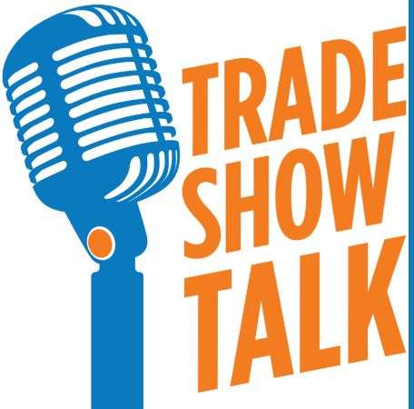 Blue microphone with Trade Show Talk next to it in Orange
