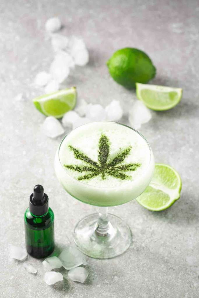 Cannabis tincture cocktail made with lime, vodka, egg white and matcha powder CBD 2022