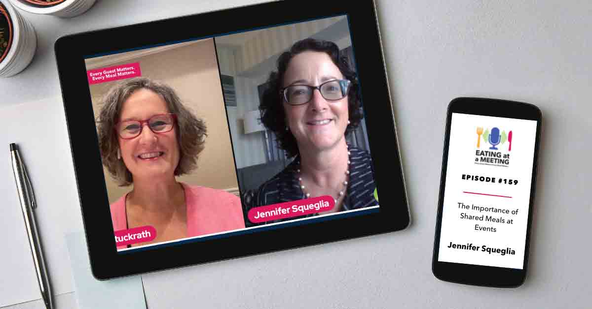 An iPad and iPhone on a table. On the iPad is a picture of two men who are on video screen. On the iPhone is the Eating at a Meeting podcast logo with Episode #159 The Importance of Shared Meals at Events with Jennifer Squeglia