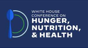 blue background with a white and green plate line drawing with a blue fork to the left of the words white house conference hunger nutrition and health written in white