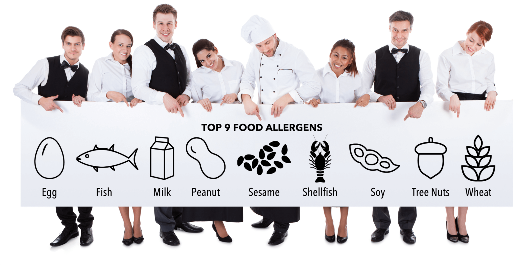 Group of catering staff holding a banner with the Top 9 Food Allergens icons across it.