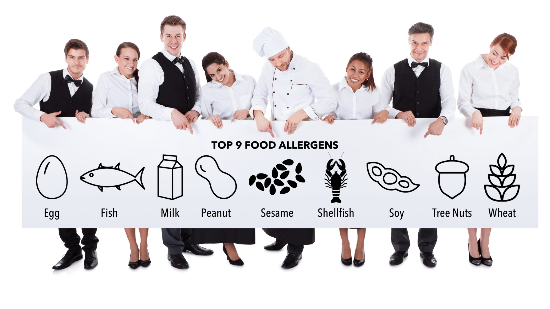 Group of catering staff holding a banner with the Top 9 Food Allergens icons across it.