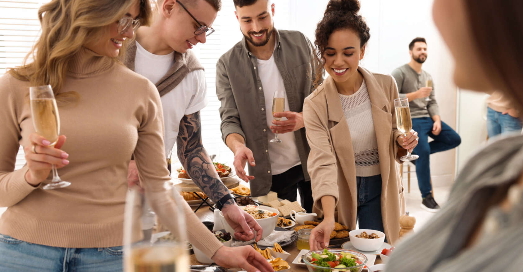 Group of people enjoying brunch buffet together indoors Event Safety at Events