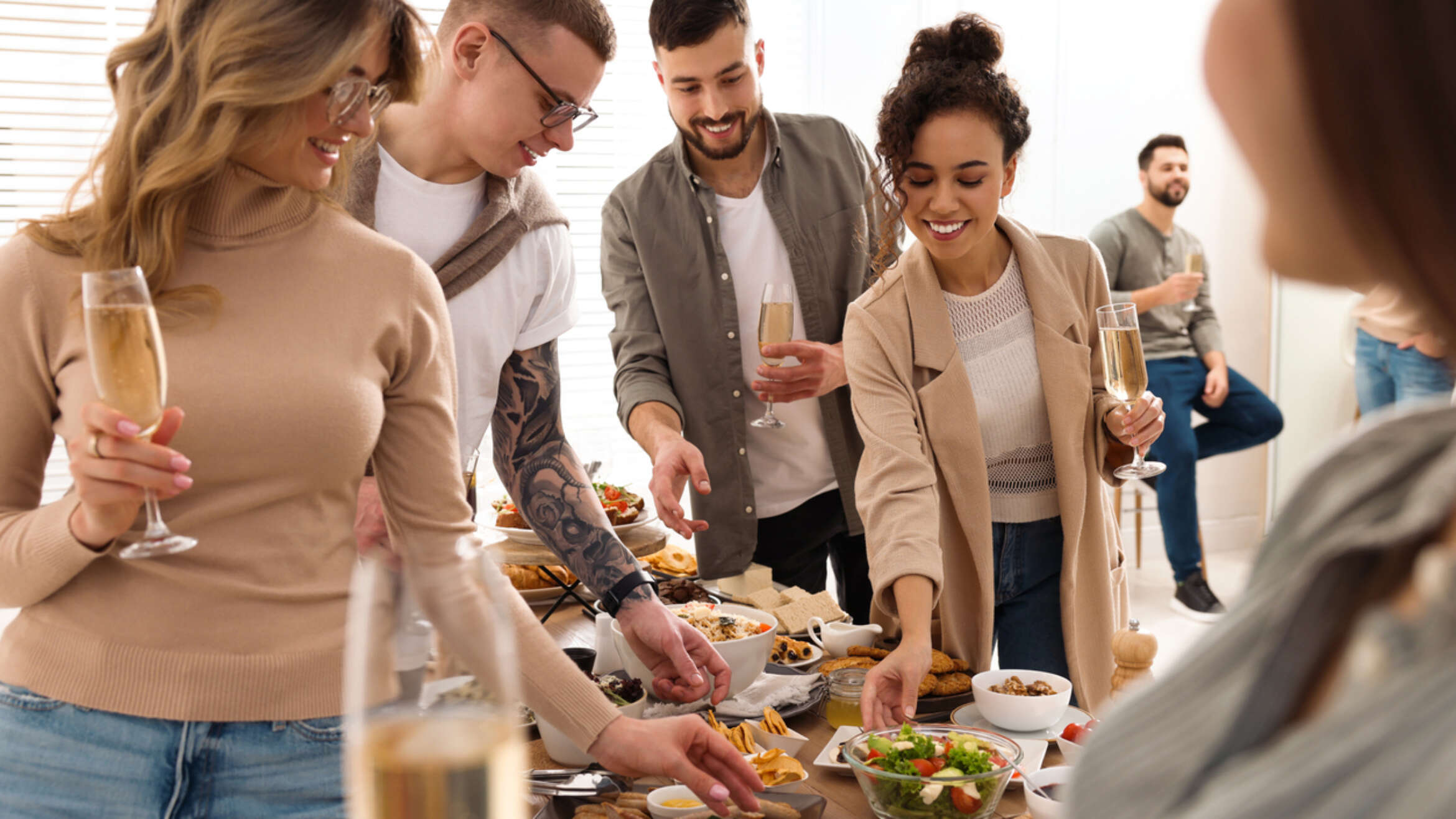 Group of people enjoying brunch buffet together indoors Event Safety at Events