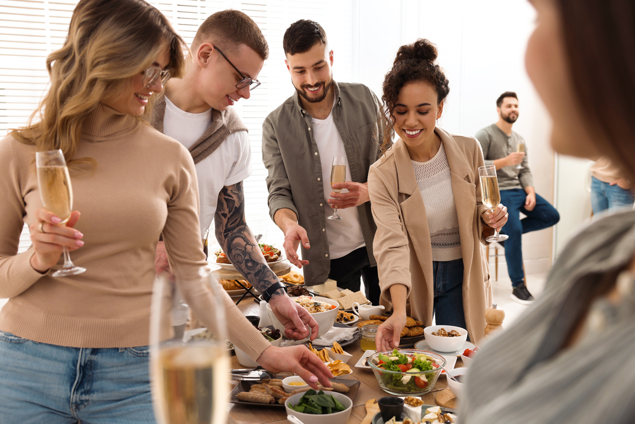 Group of people enjoying brunch buffet together indoors Event Safety at Events